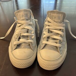 Metallic silver All-Stars women’s size 7 1/2